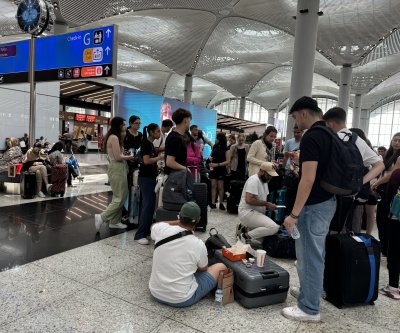 More flights canceled amid slow recovery from IT outage