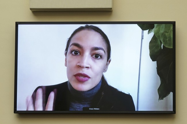 Alexandria Ocasio-Cortez Charges in to Rescue Biden From the Windmills of Her Own Mind