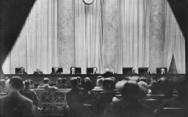 One of two photographs in existence of the US Supreme Court in session. Taken by a young women who cut a hole in her handbag through which the lens peeped (1937)